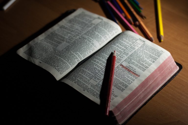 Image of Bible with Highlighter pencil on it
